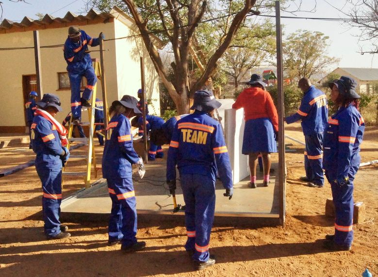 TEAM crew constructing a visitor shelter