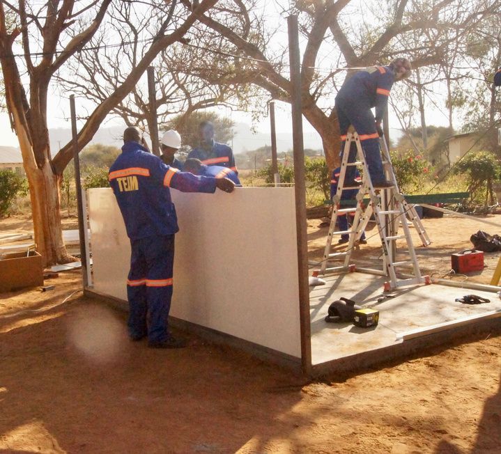 TEAM team members on site at Pudulogong